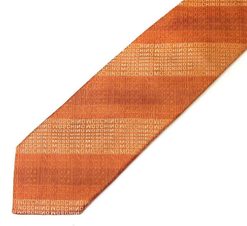 Оранжевый шёлковый галстук с надписями Moschino в полоску