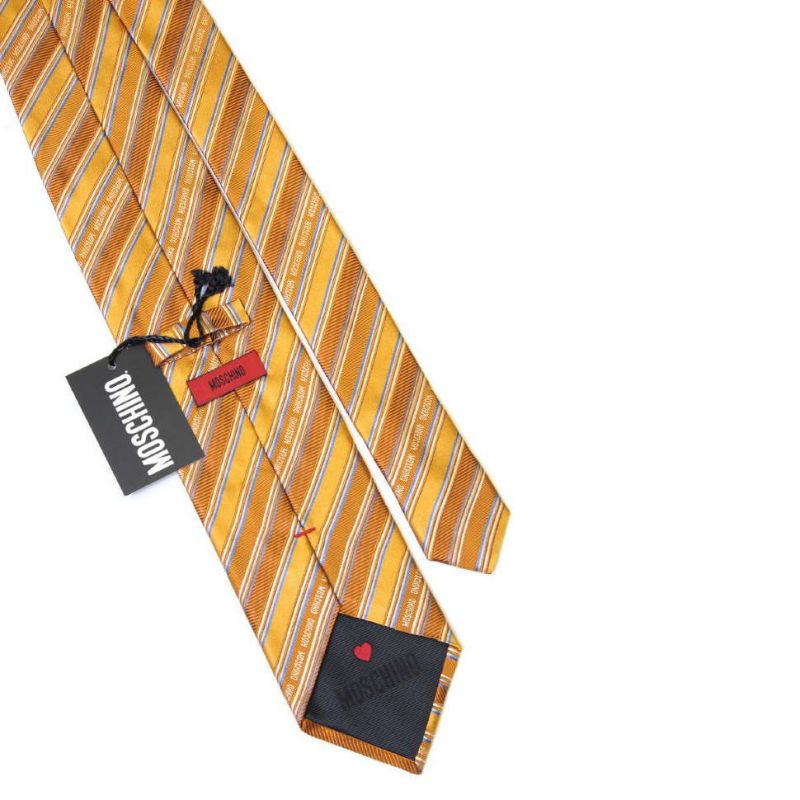 Оранжевый галстук из шёлка с надписями Moschino в полоску
