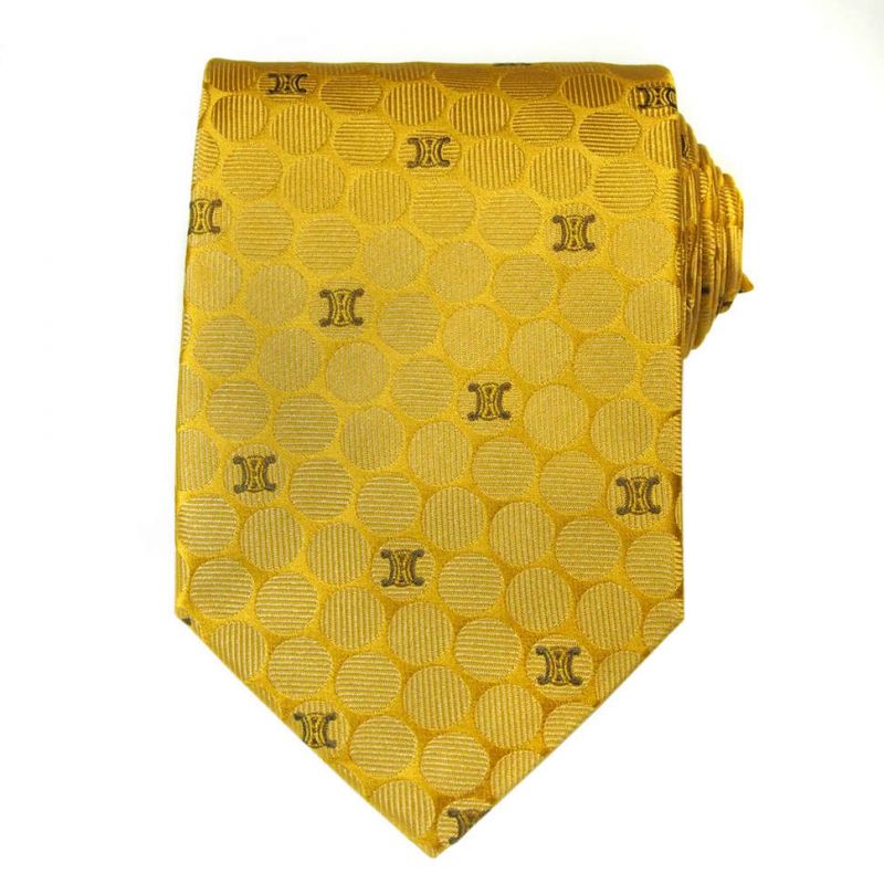 Золотой шёлковый галстук со значками Celine в горошек