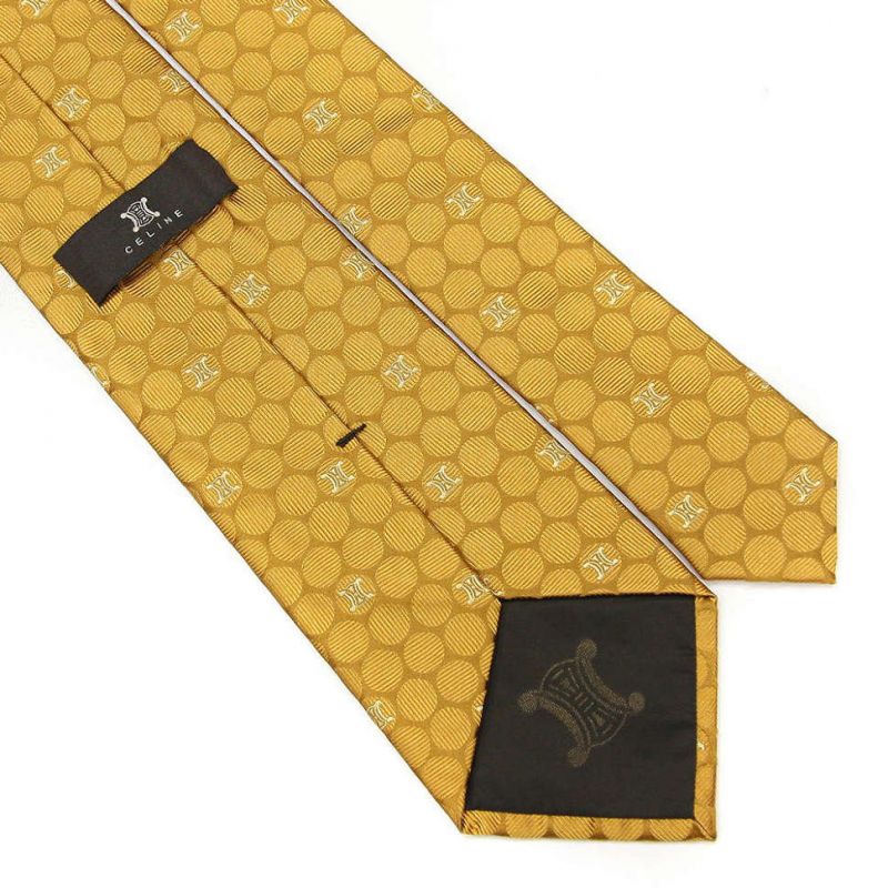 Золотистый шёлковый галстук Celine в кружок