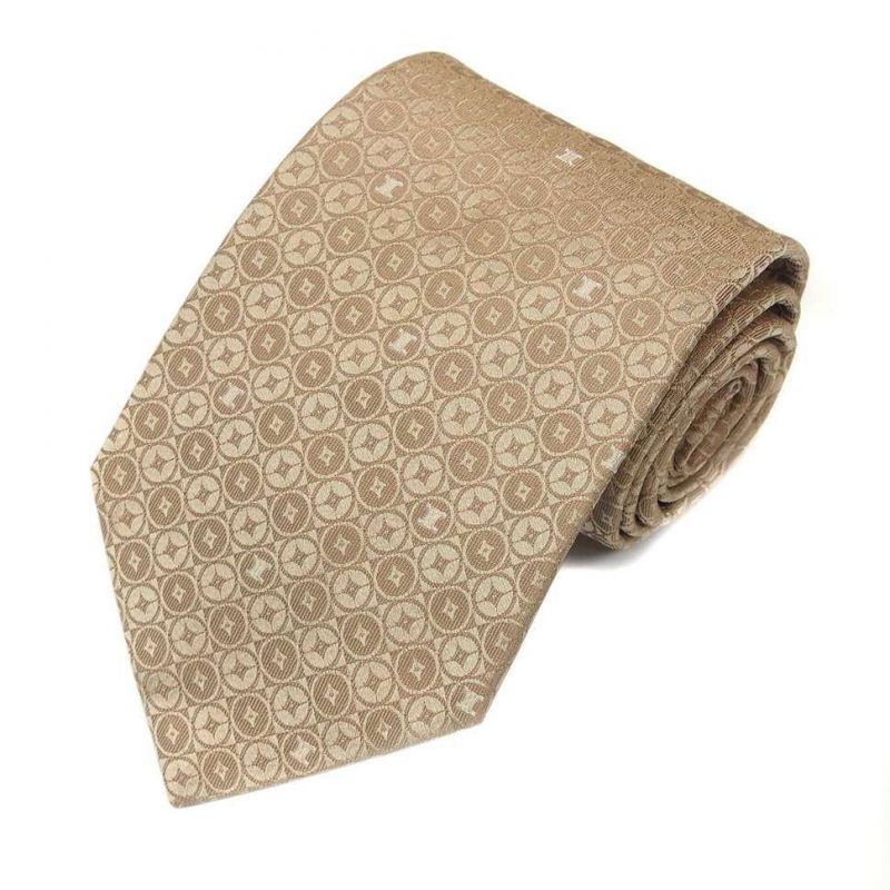 Бежевый шёлковый галстук Celine в горошек