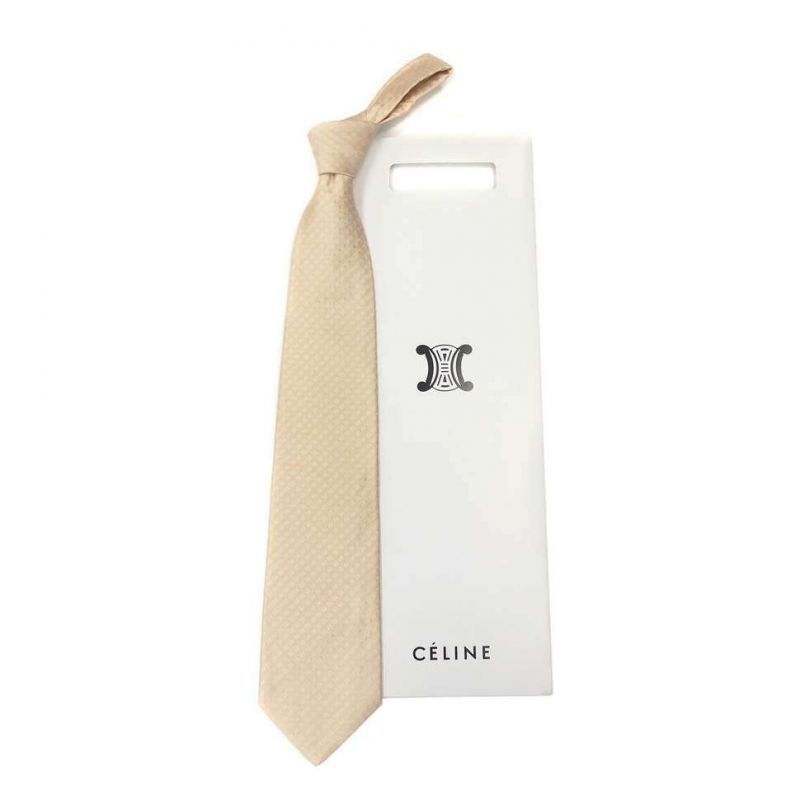 Бежевый шёлковый галстук Celine с выработкой