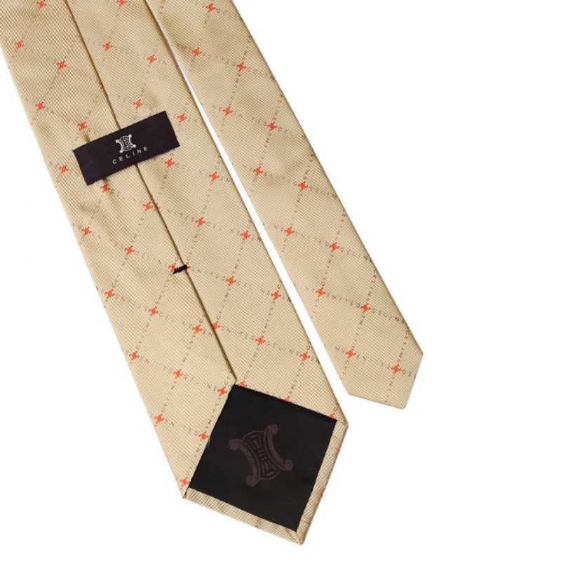 Бежевый шёлковый галстук с рисунком из надписей Celine