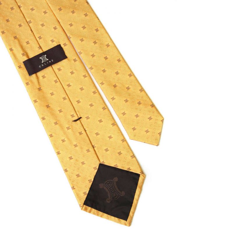 Жёлтый шёлковый галстук со знаками Celine