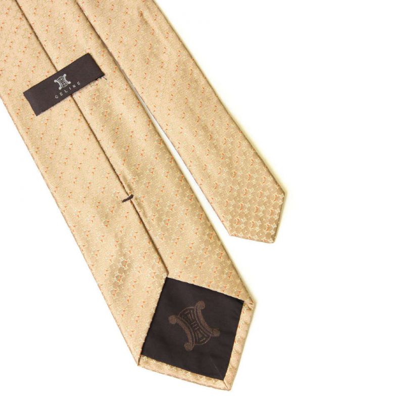 Золотистый шёлковый галстук Celine с выработкой