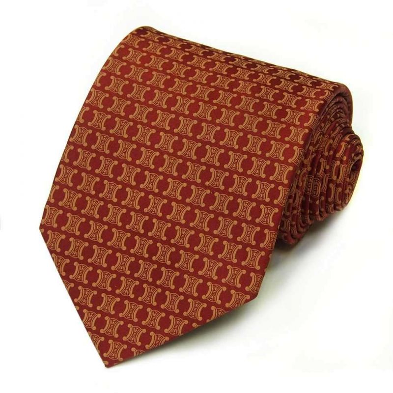 Бордовый шёлковый галстук с золотистыми логотипами Celine