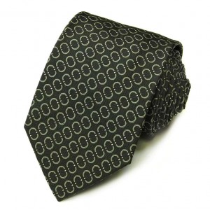 Тёмно-зелёный шёлковый галстук Celine с овалами